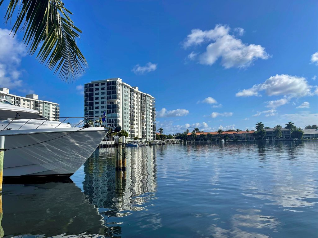 A yacht moored on the Intracoastal Waterway in front of Delray Beach condominium buildings